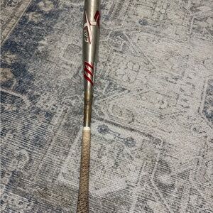Silver and Red Baseball Bat